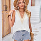 Kvinners ermeløs topp med V-formet utskjæring