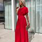 Ensfarget jumpsuit med plisserte ben og høy midje