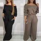 Av skulder jumpsuit med V-rygg og elastisk midje